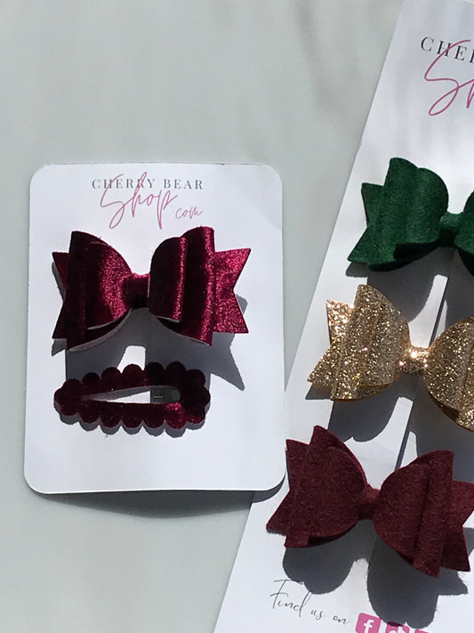 "Enchanting Holiday Hair Accessories: Collection in Green, Glitter Gold, and Burgundy Hues + Burgundy Hair Bow with Matching Snap Clip"
